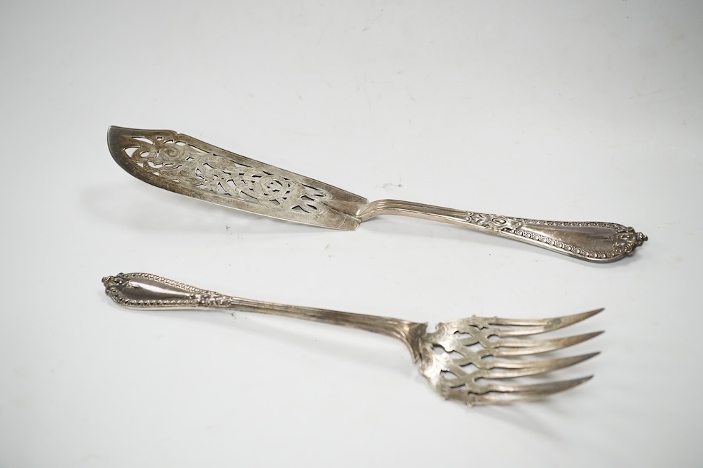 A cased pair of Victorian silver fish servers, by George Adams, indistinct marks, knife 32.7cm, 11oz. Condition - fair